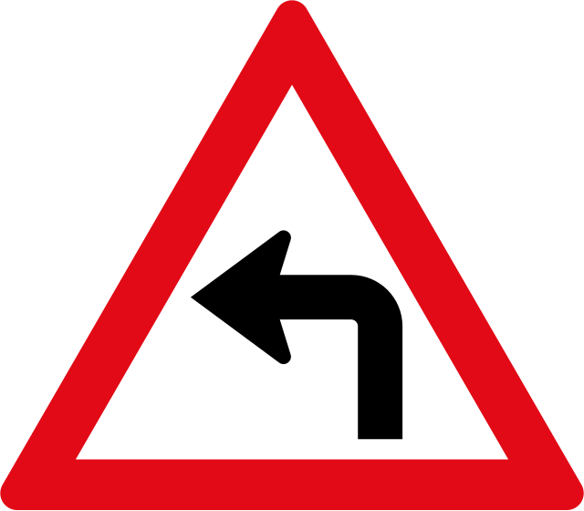 Warning sign: sharp turn to the left